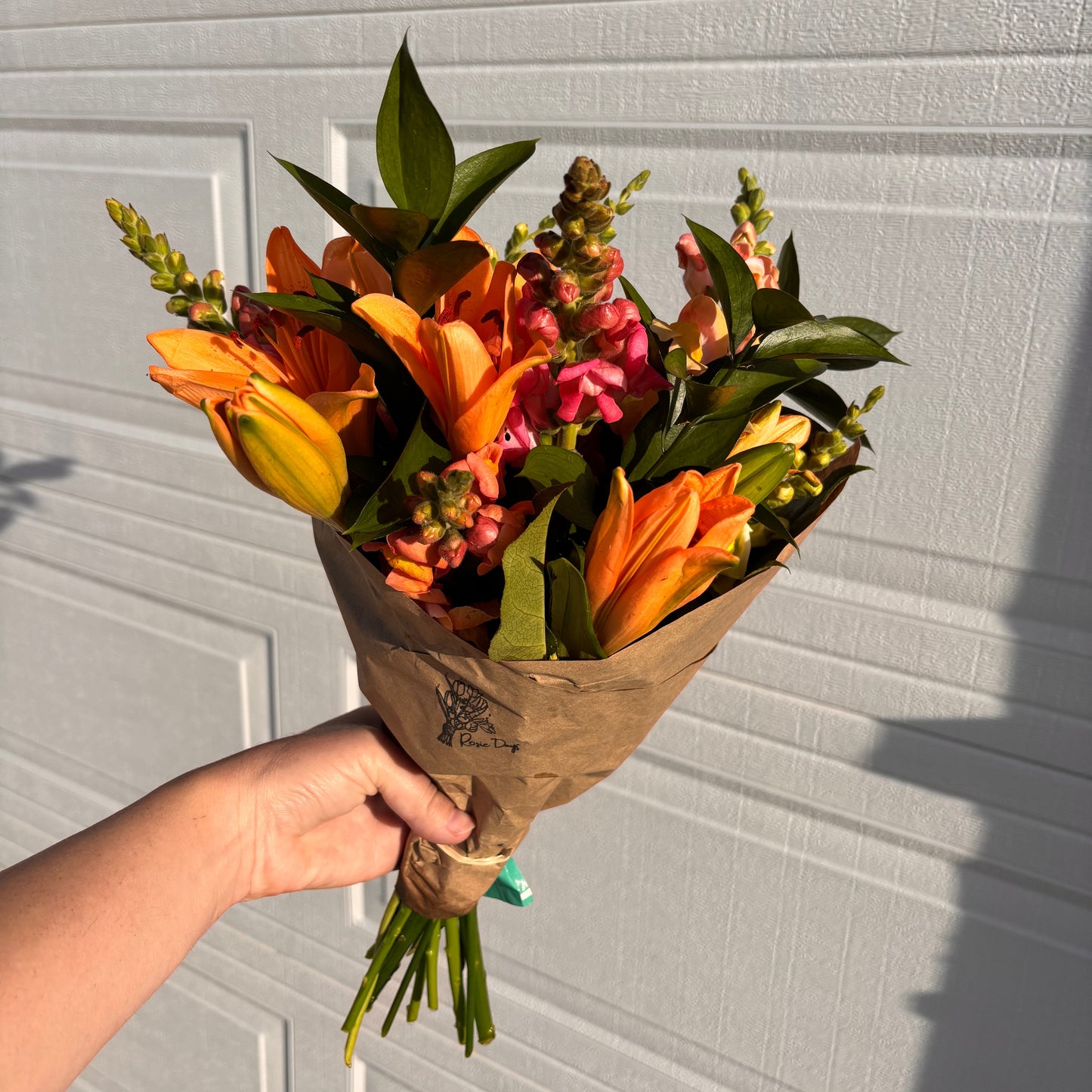Mixed summer bouquet with Lillies and Snapdragons grown at Rosie Days Flower Farm in Ankeny, Iowa
