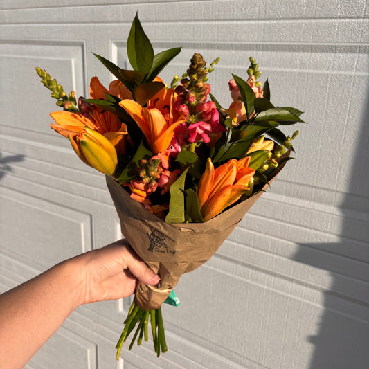 Mixed summer bouquet with Lillies and Snapdragons grown at Rosie Days Flower Farm in Ankeny, Iowa
